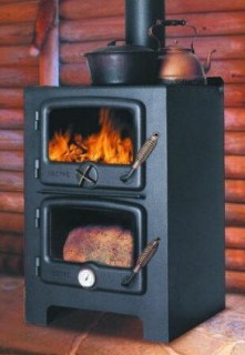 Cast iron wood stove with oven, wood burning stove, wood cook stove.